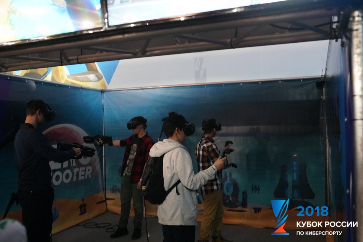 Four participants play Zerg Shooter in VR